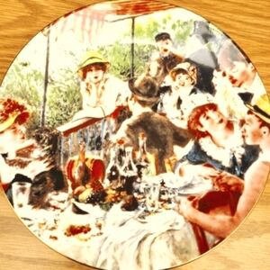 Pierre Auguste-Renoir's Luncheon of the Boating Party on fine bone china